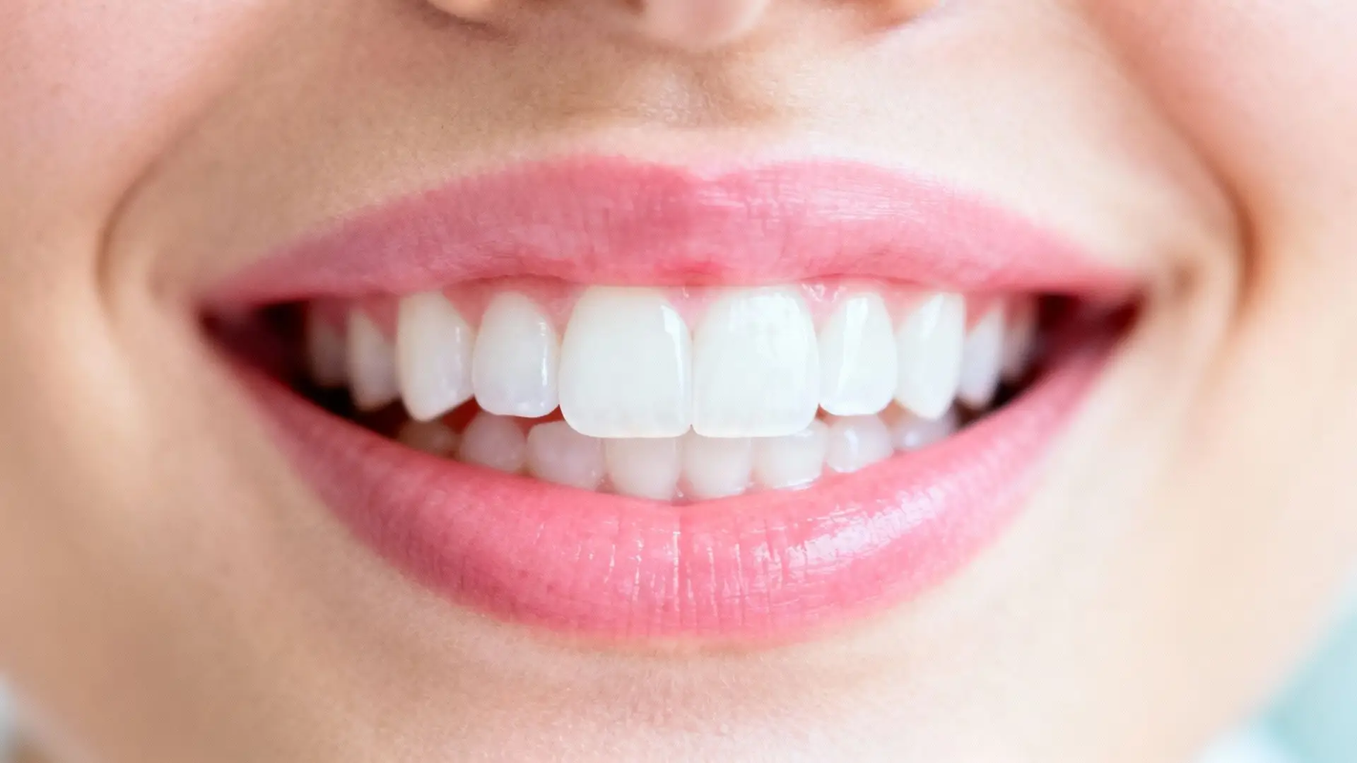 Healthy gums and a mouth with a bright, white smile.